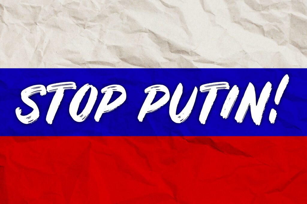 Foto von Tim Reckmann Russland Flagge mit Stop Putin! Schriftzug.
